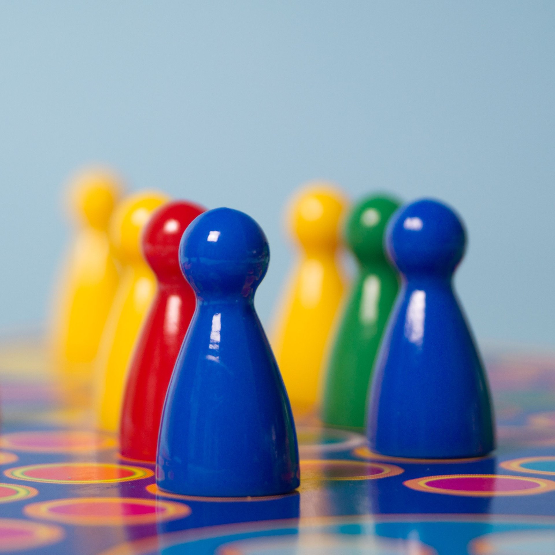Colorful game pieces representing diversity and inclusion